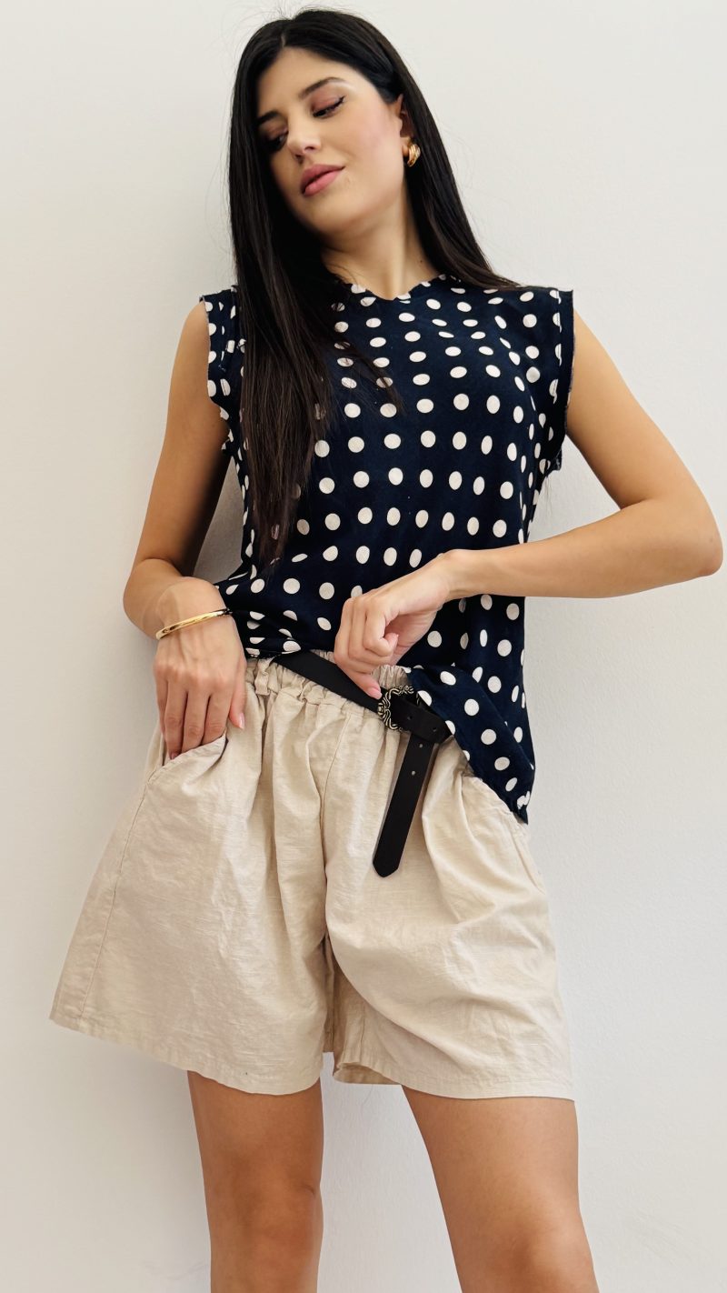 Blusa smanicata pois