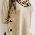 Maglioncino bottoni spacchi